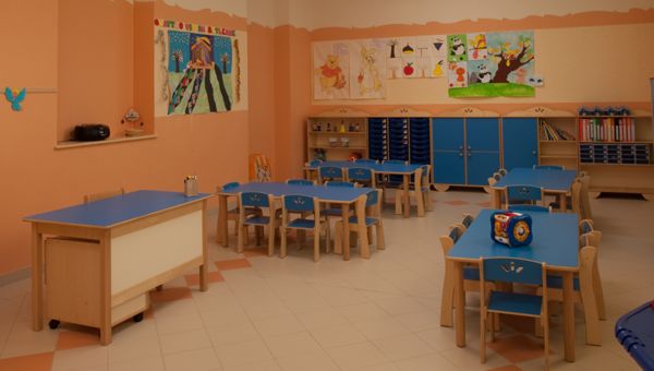 Tables, chairs and furniture with containers for kindergarten